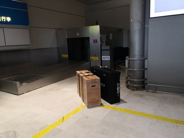 到着空港で受け取り